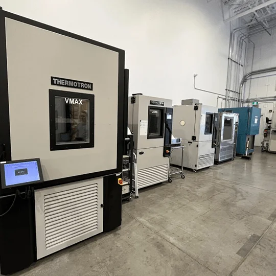 Environmental test chambers used for thermal validation of liquid cooling equipment.