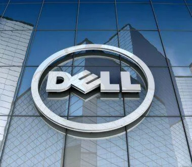 Dell corporate logo displayed on a mirrored glass building associated with enterprise data centre operations.